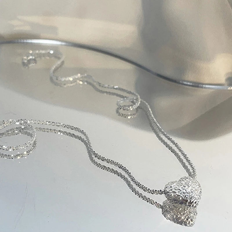 Conjunto de corazón de plata