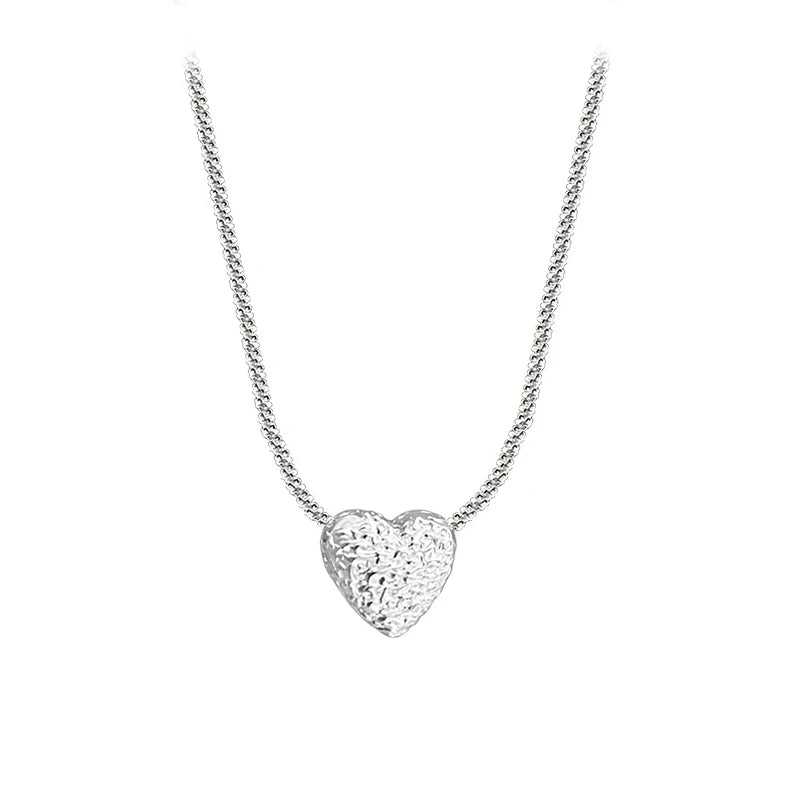 Conjunto de corazón de plata